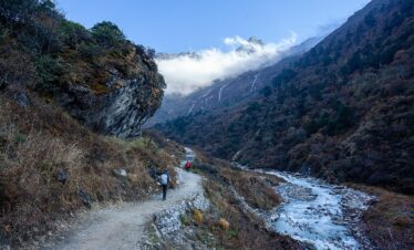 Panoramic Himalayan mountain view with rugged trails on the route to Tsho Rolpa Glacial Lake, Nepal