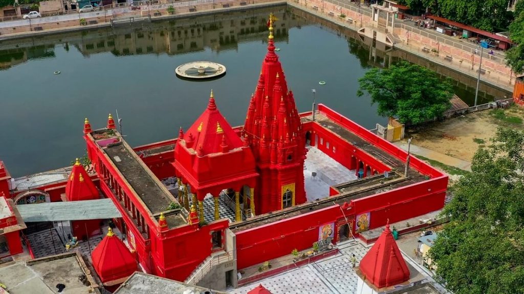 Durga Mandir in Varanasi showing its iconic red facade and temple structure under clear daylight