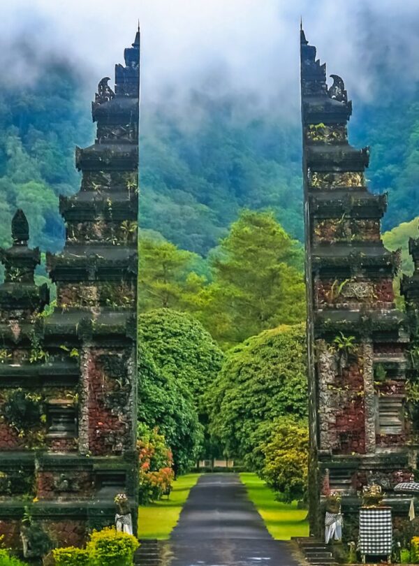 The iconic Handara Gate framed by vibrant greenery and tropical plants in Bali