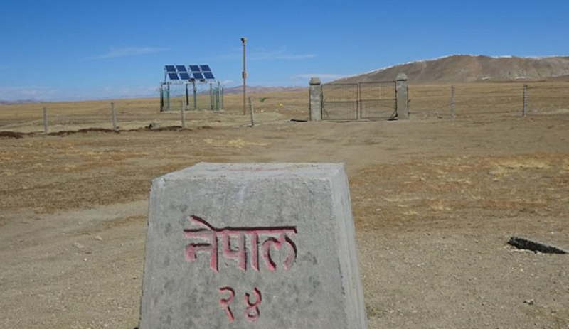 Korala Border pillar marking the Nepal-China boundary amid Upper Mustang’s rugged landscape
