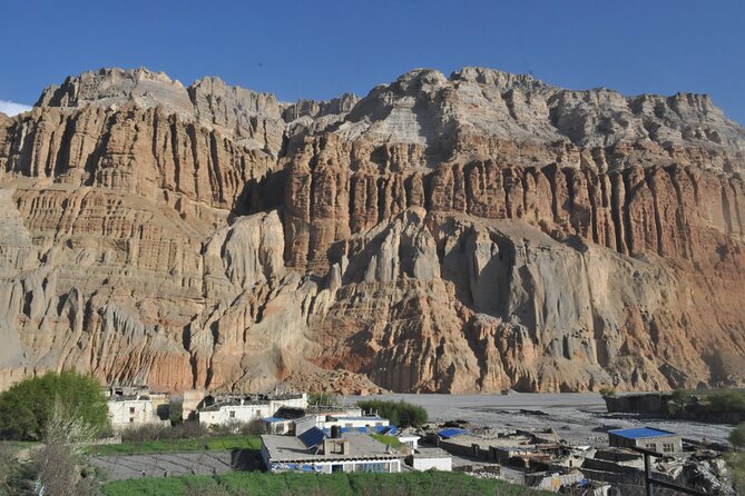 Panoramic view of rolling hills and rugged terrain in the Mustang region of Nepal